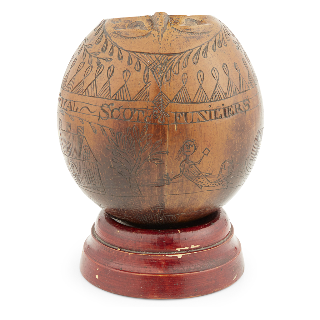 ROYAL SCOTS FUSILIERS - A CARVED BUGBEAR COCONUT CUP