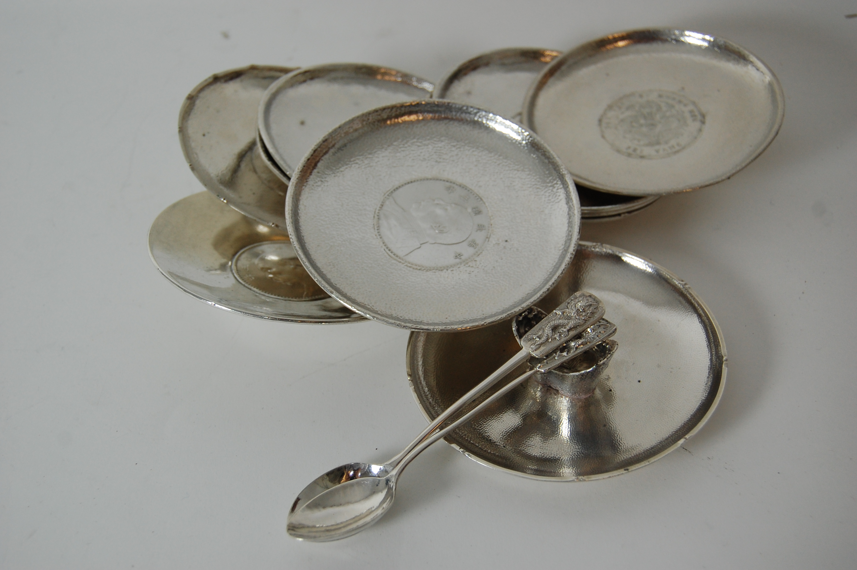 A group of nine Chinese export pin trays