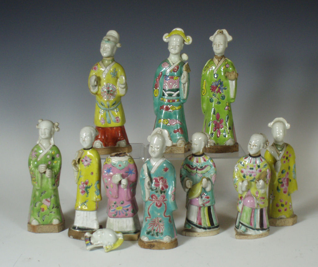 A matched group of ten 19th century Chinese moulded pottery figures of Immortals