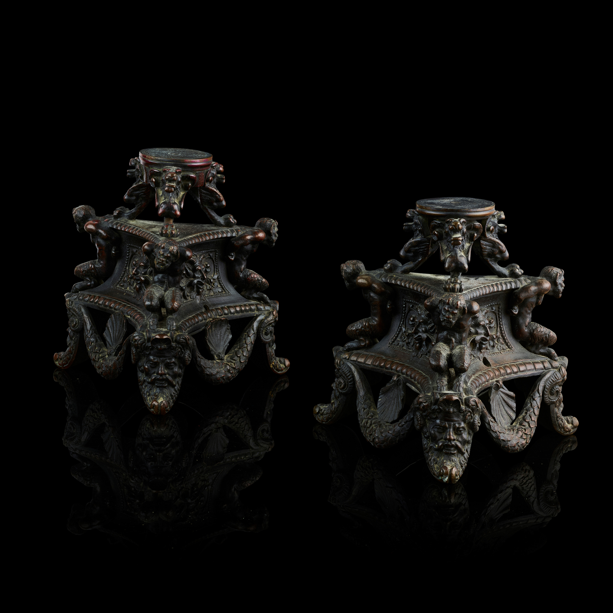 A PAIR OF ITALIAN BRONZE TRIPOD STANDS