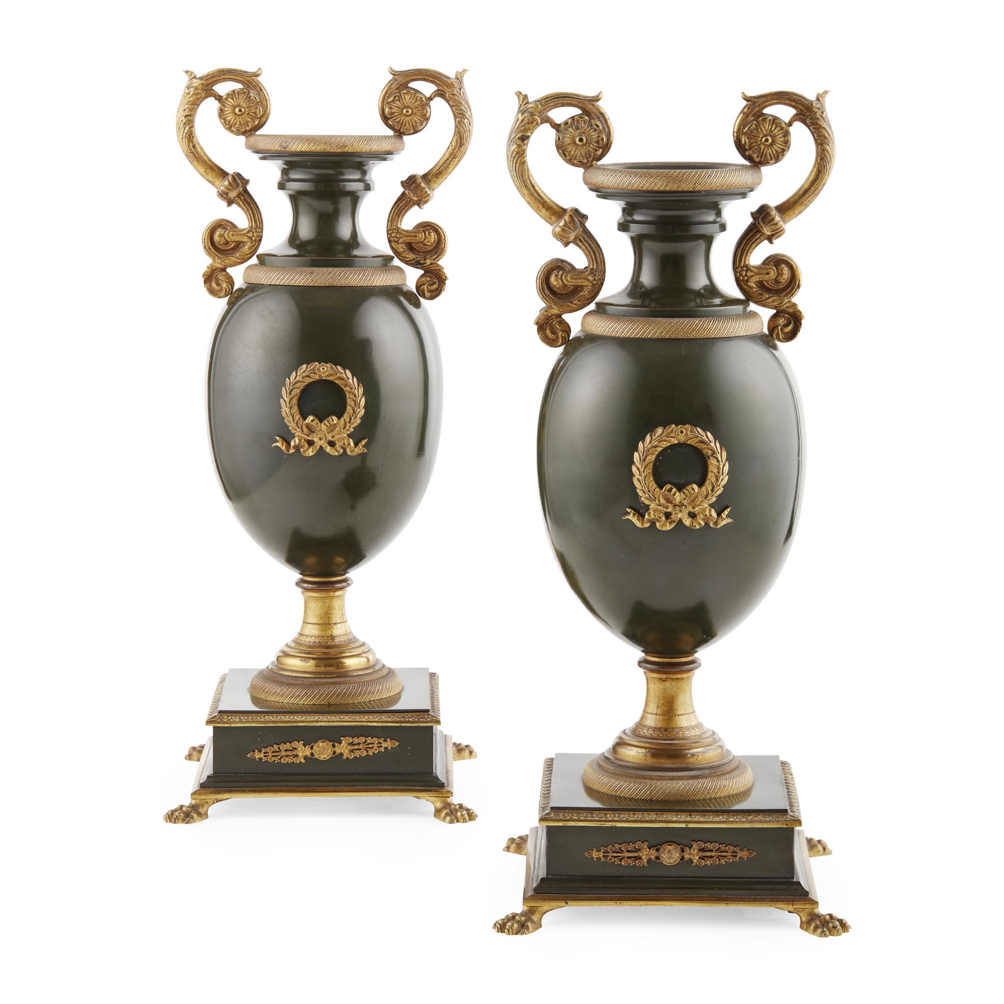 PAIR OF EMPIRE STYLE GILT AND PATINATED BRONZE URNS
