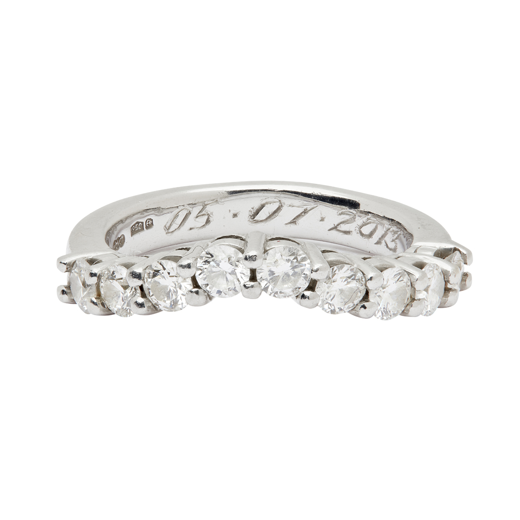 A diamond set half eternity ring