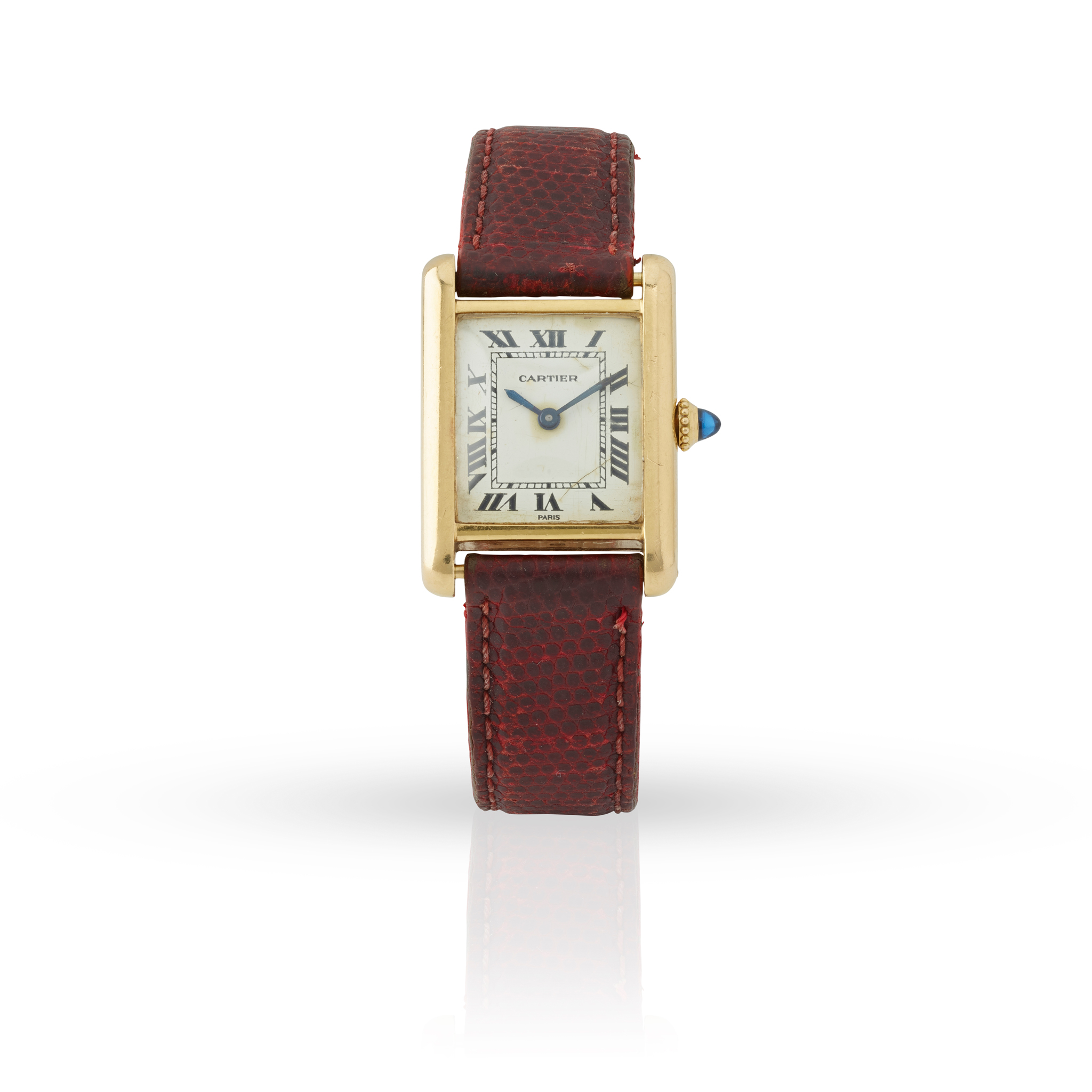 Cartier, Paris. An unusual 18k yellow gold mid-size rectangular mechanical wristwatch with deployant clasp,