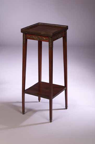 A two tier mahogany étagère