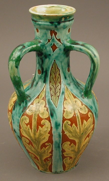 A Della Robbia three handled vase