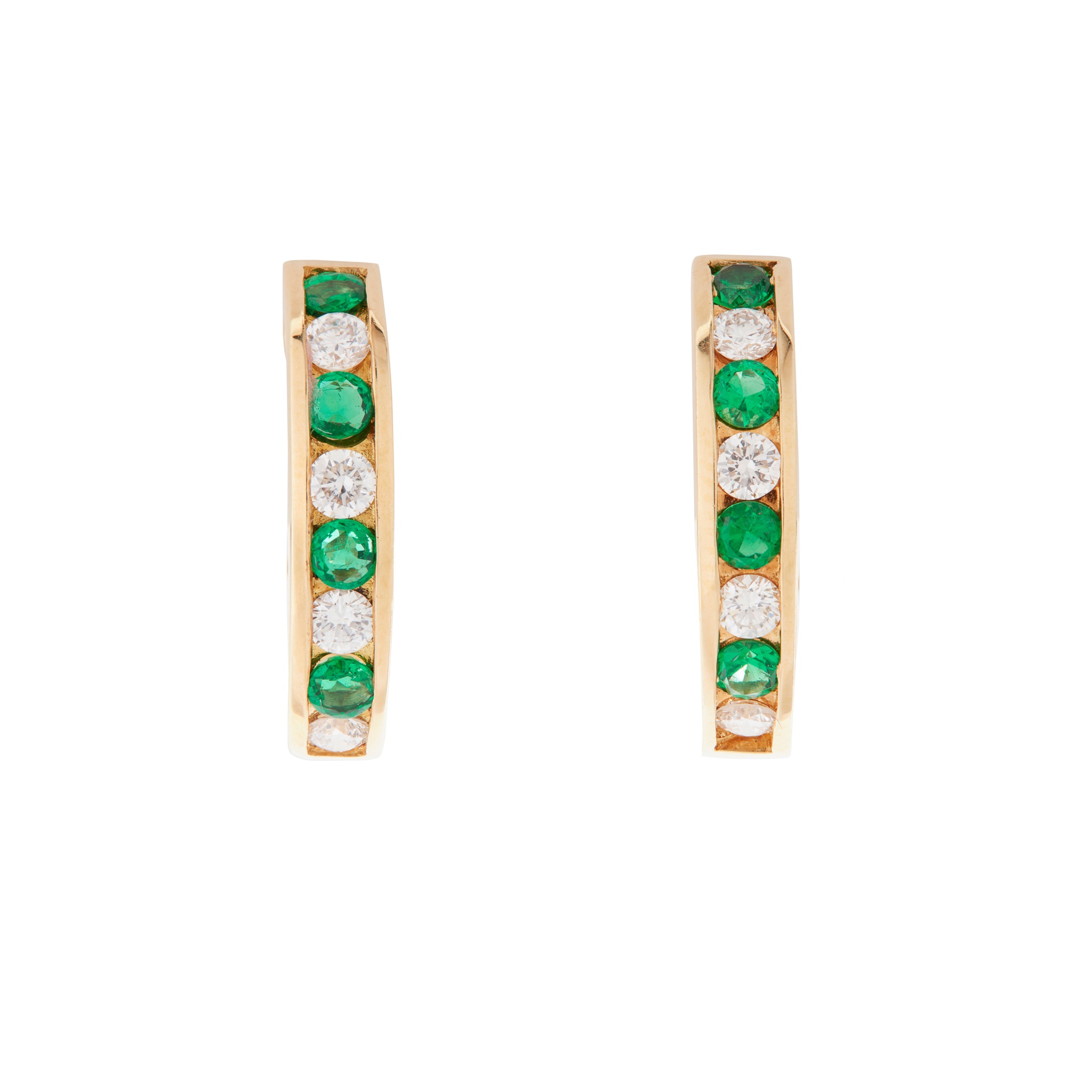 A pair of emerald and diamond clip earrings