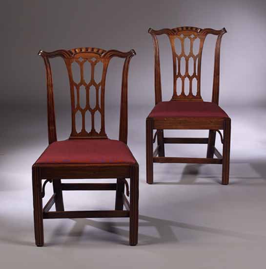 A set of six George III style mahogany dining chairs,