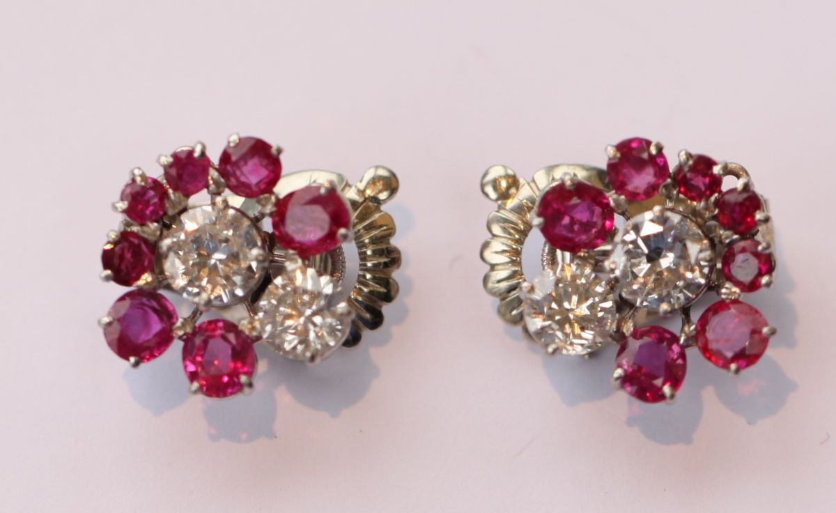 VAN CLEEF & ARPELS - a pair of ruby and diamond ear clips
