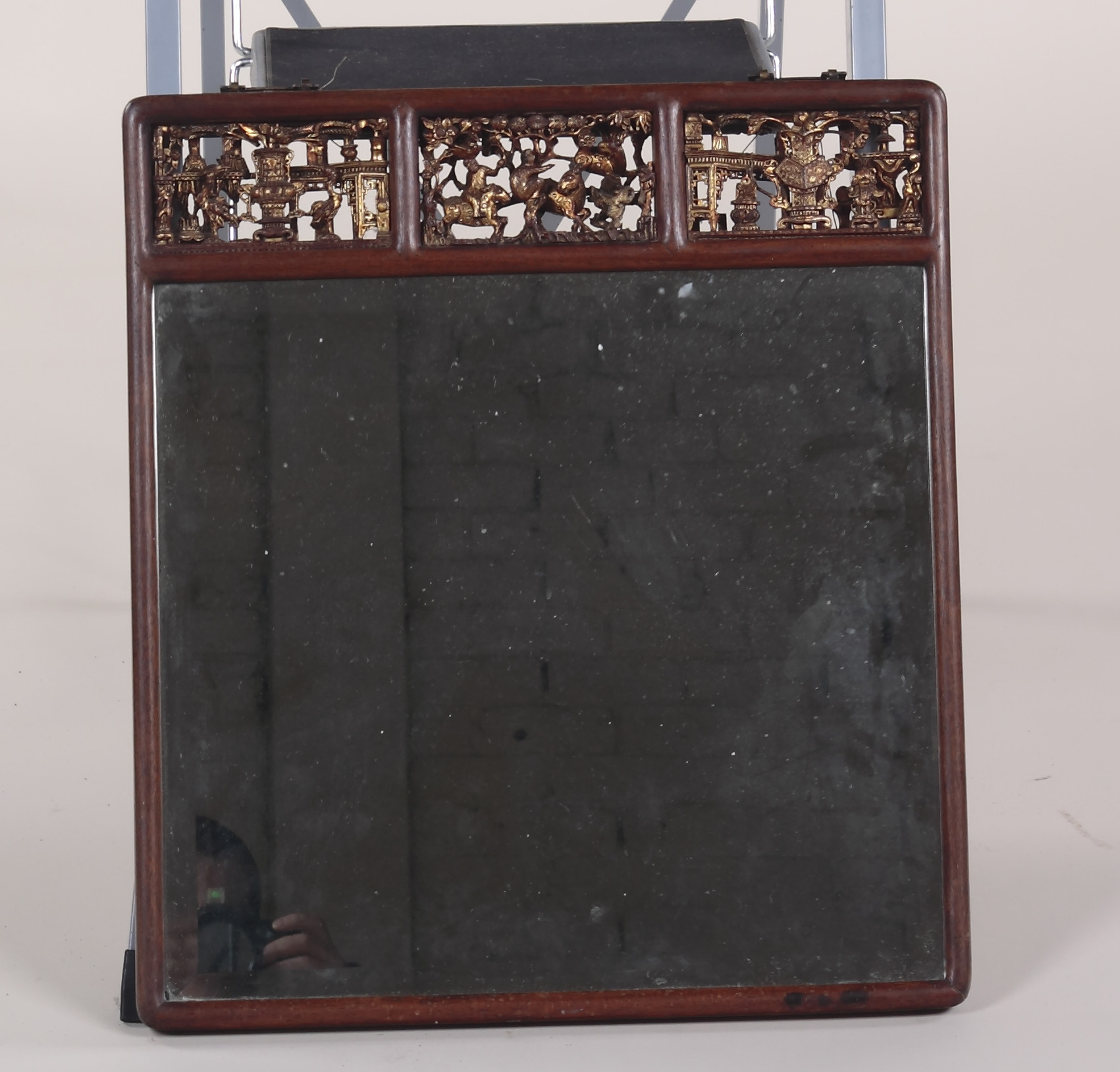 A small 20th century Chinese hardwood display cabinet