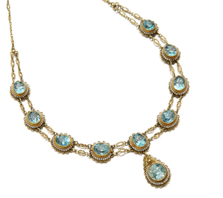 A blue zircon and seed pearl set necklace,