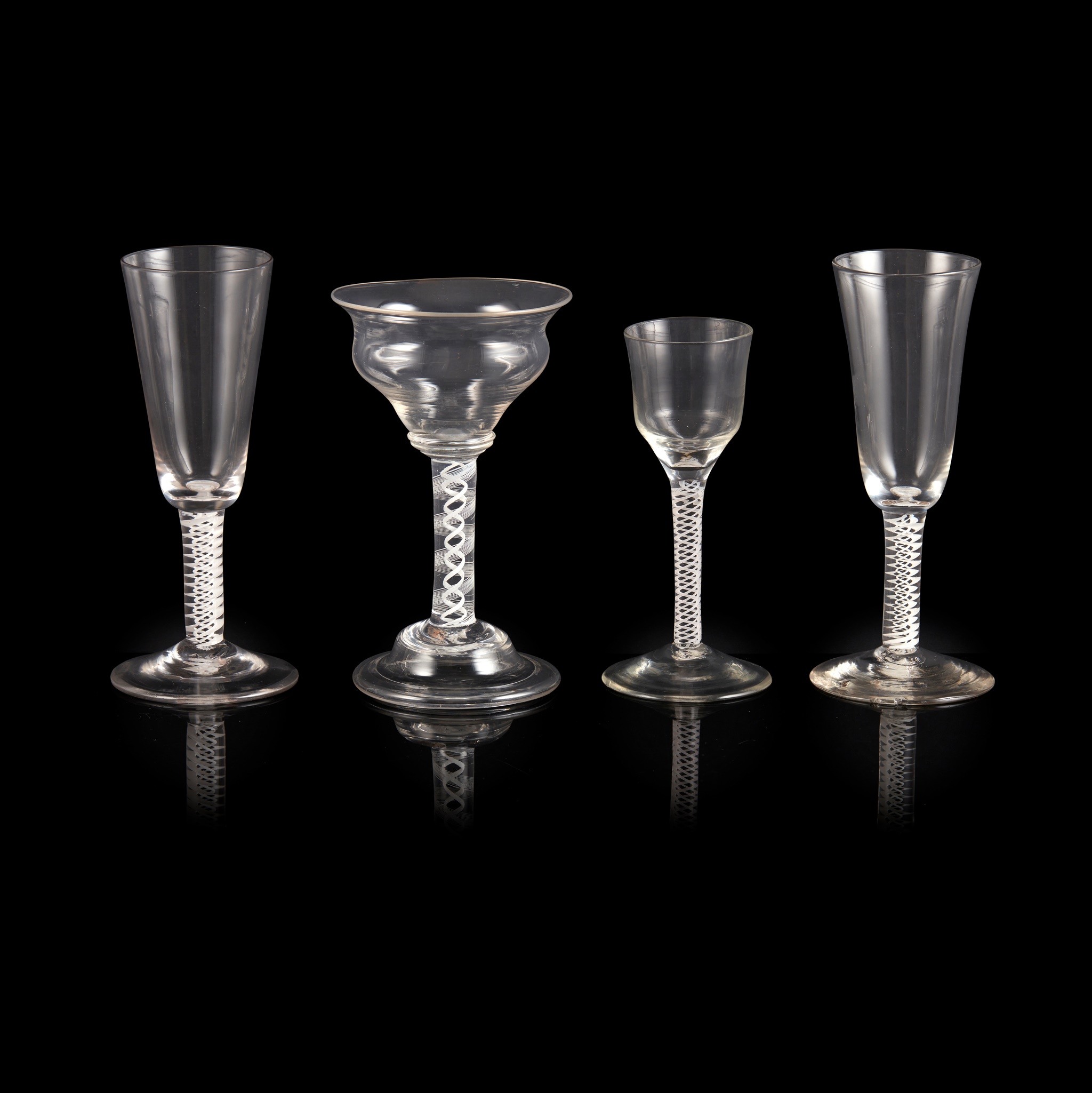 FOUR GEORGIAN OPAQUE-TWIST STEM GLASSES
