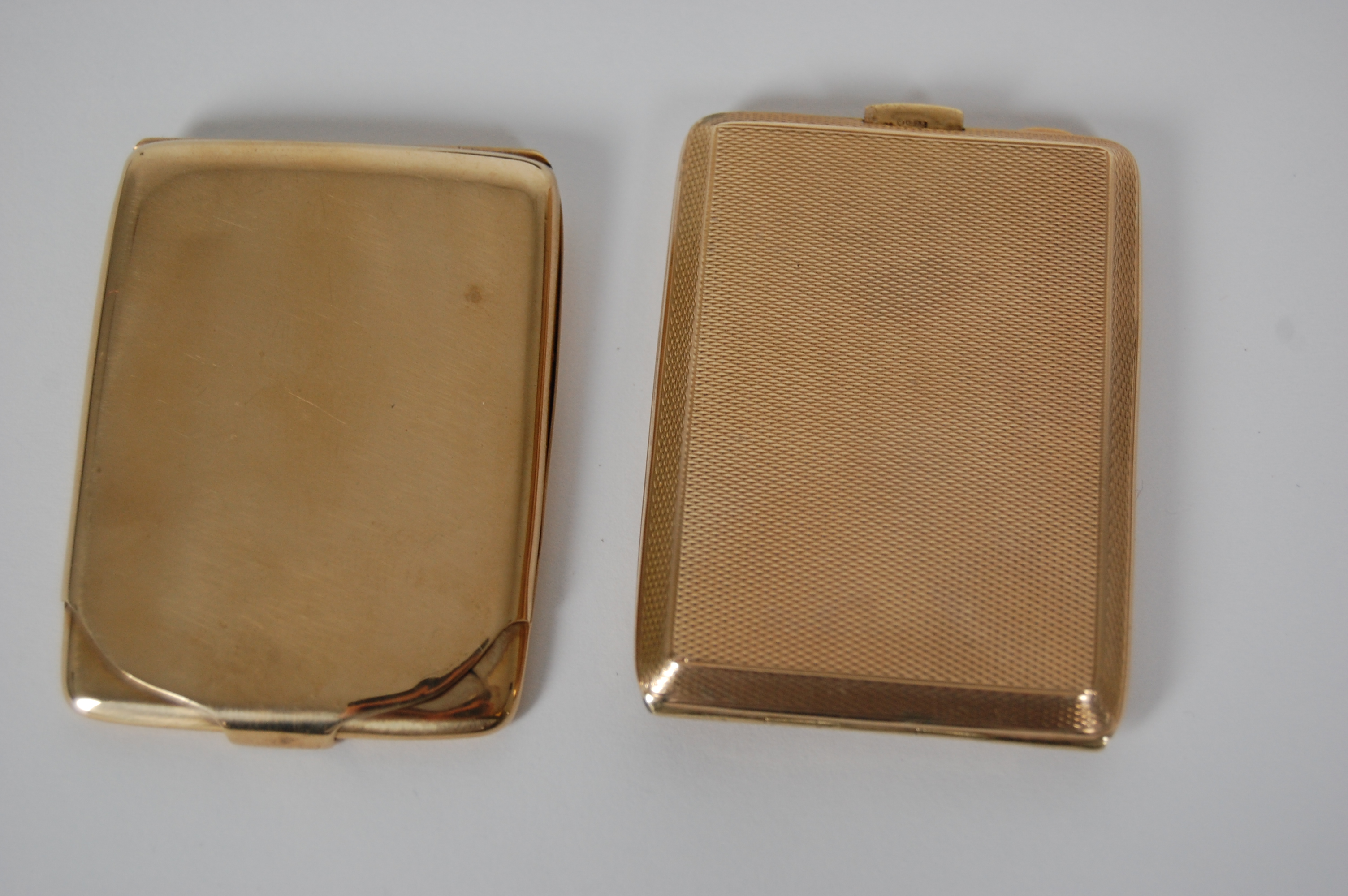 Two 9ct gold match book covers