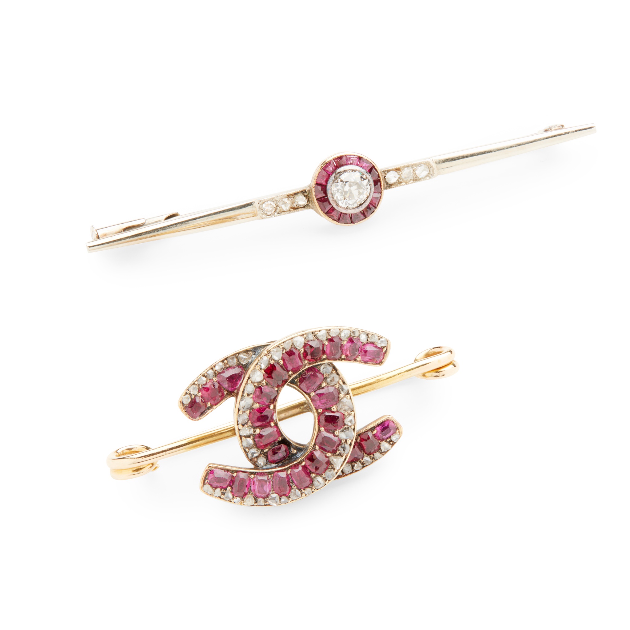 Two ruby and diamond brooches