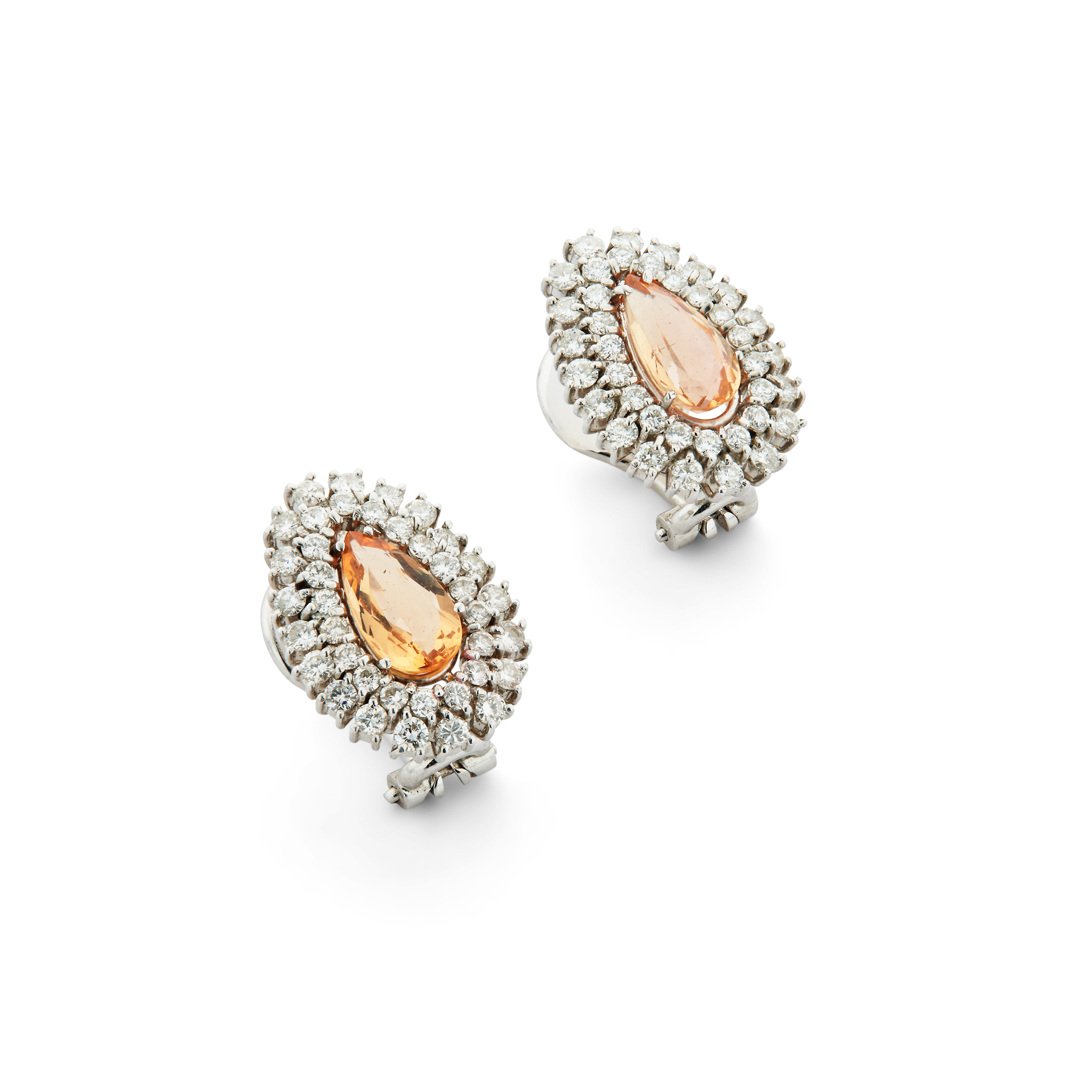 A pair of golden topaz and diamond cluster earrings