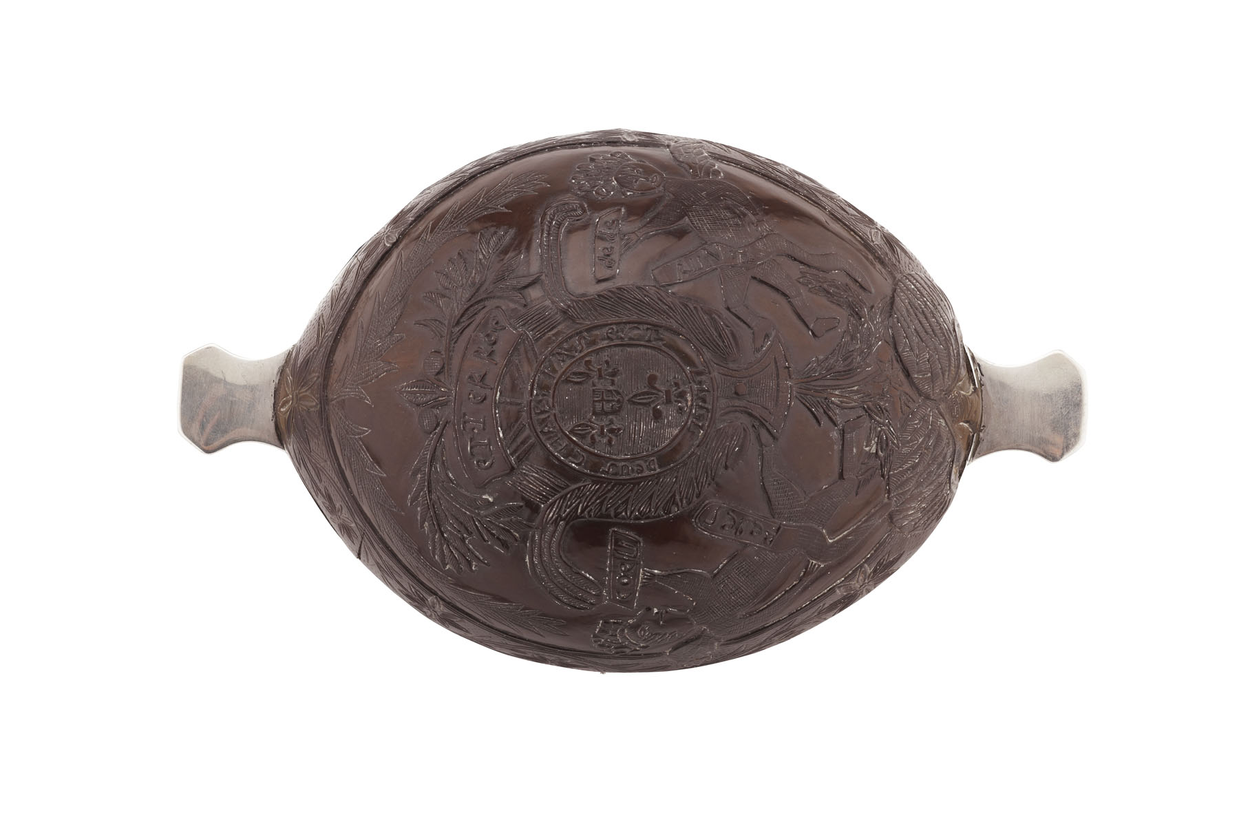 A coconut shell mounted quaich
