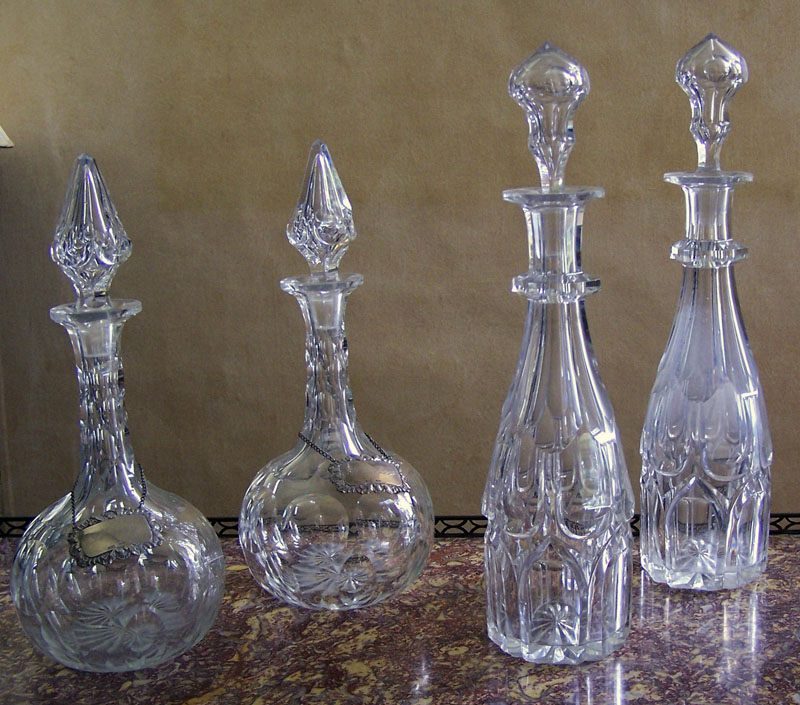 A pair of cut glass decanters and stoppers