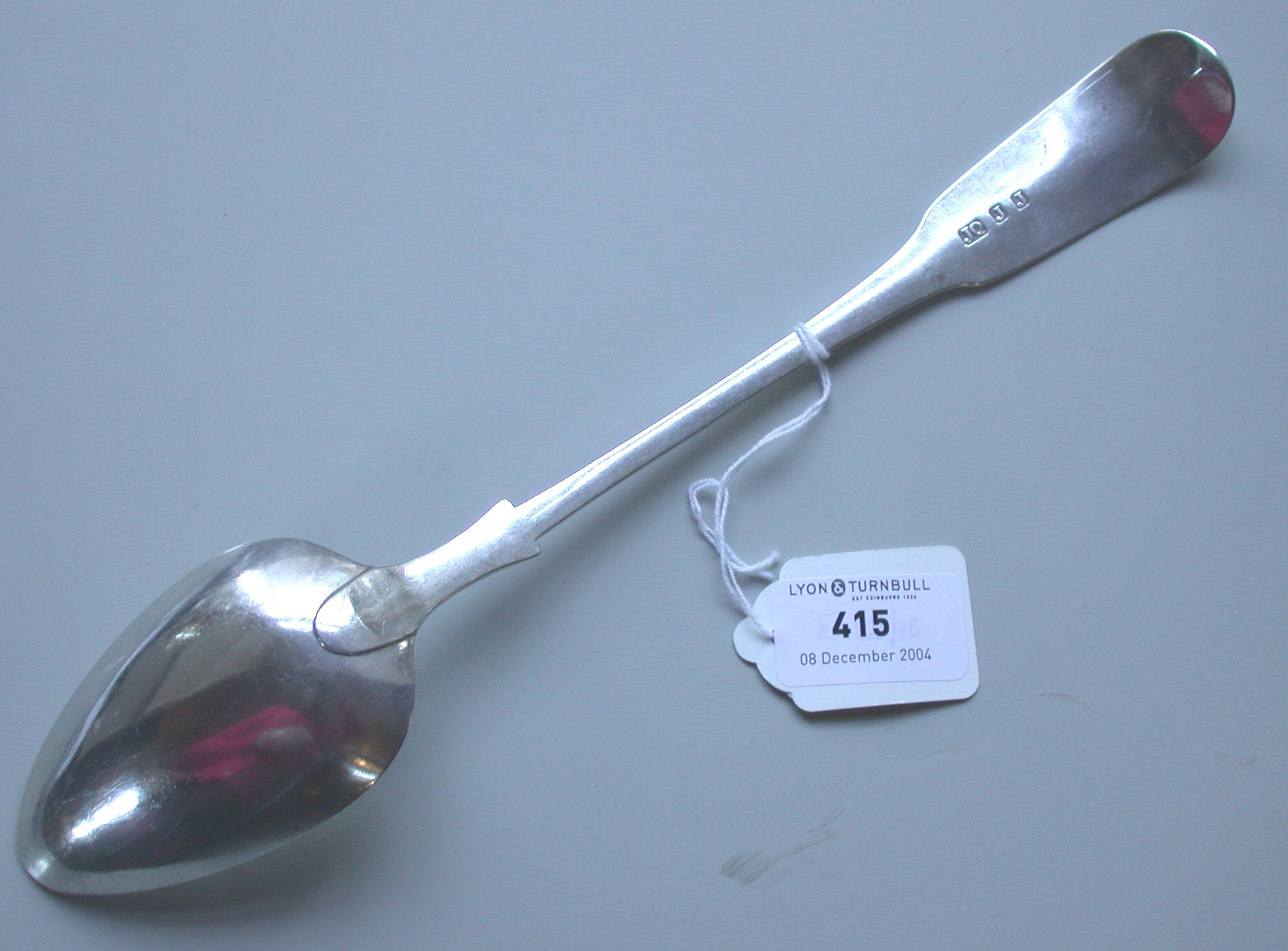 A provincial fiddle pattern tablespoon,