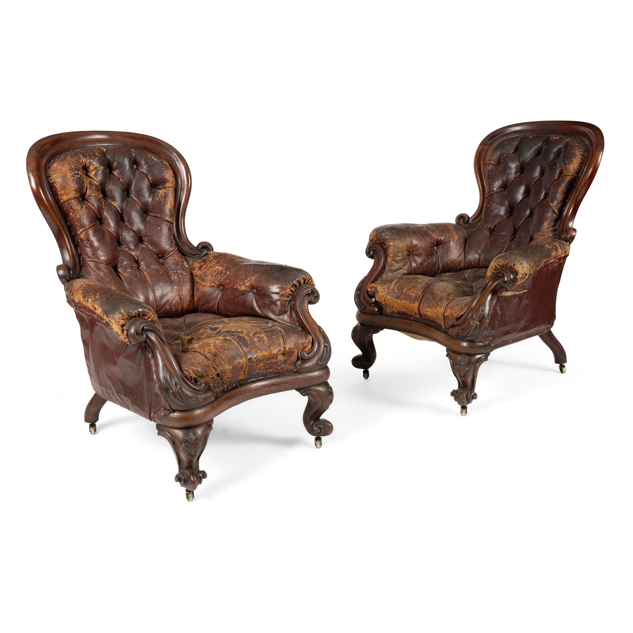A PAIR OF EARLY VICTORIAN MAHOGANY SPOONBACK LIBRARY ARMCHAIRS