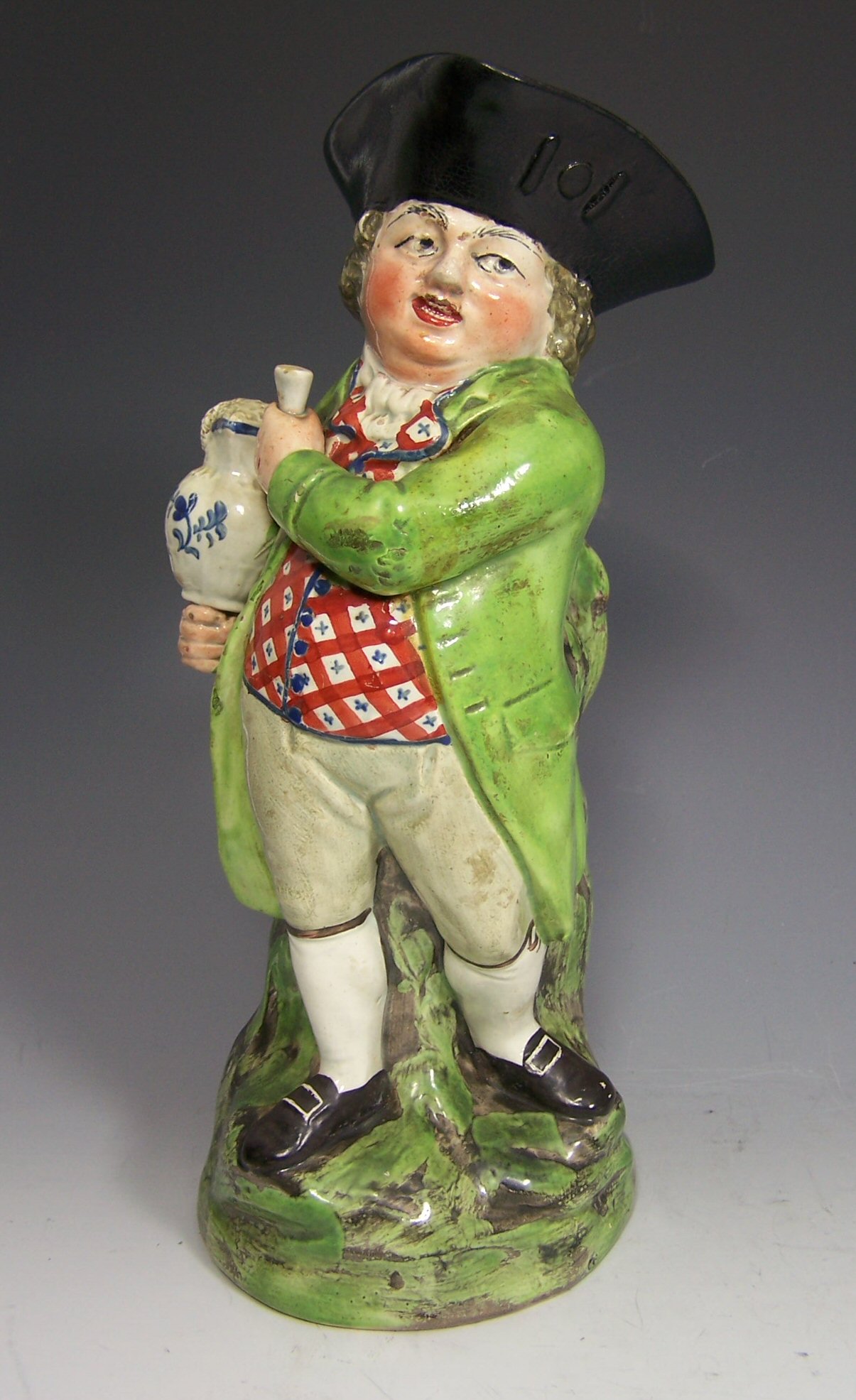 An early 19th century Walton toby jug