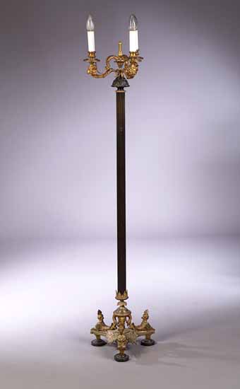 A partly gilt bronze standard lamp