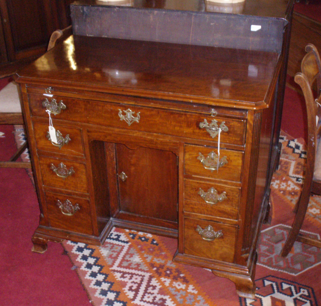 A George III mahogany kneehole desk