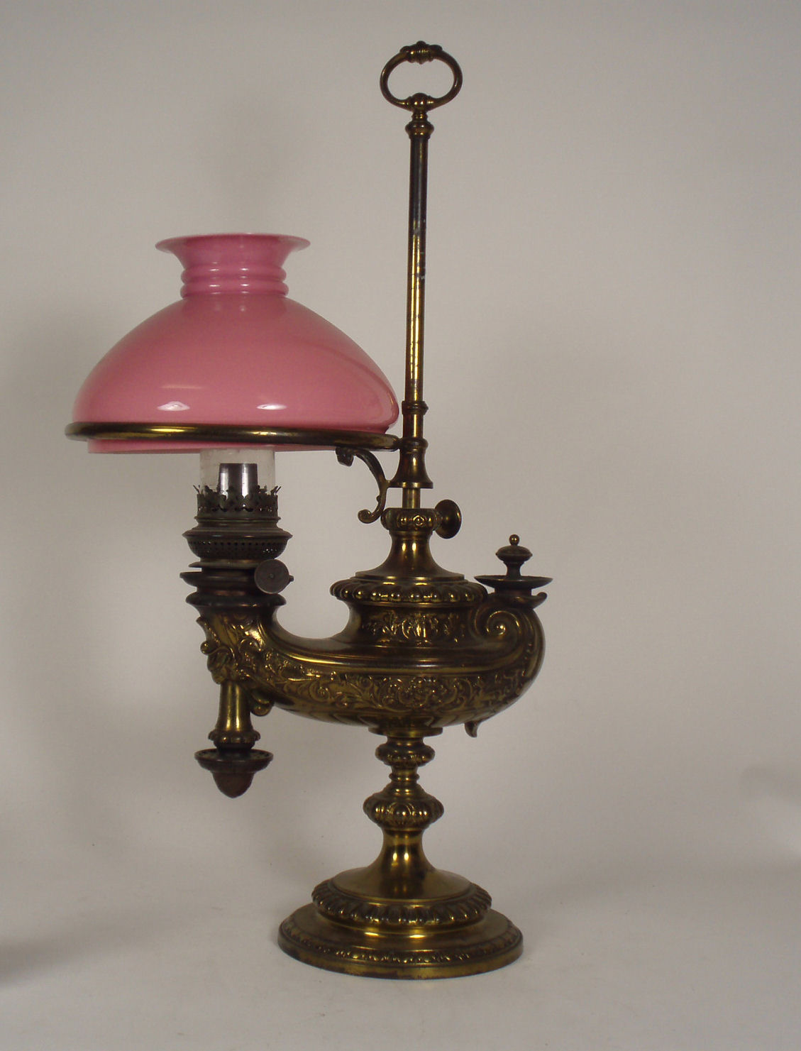 A late 19th century gilt paraffin lamp