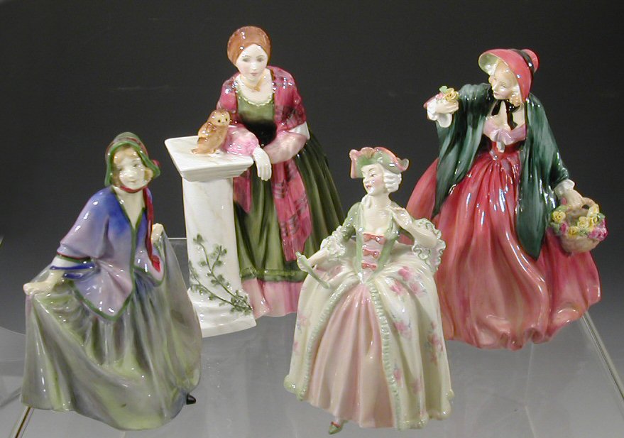 Four Royal Doulton figures