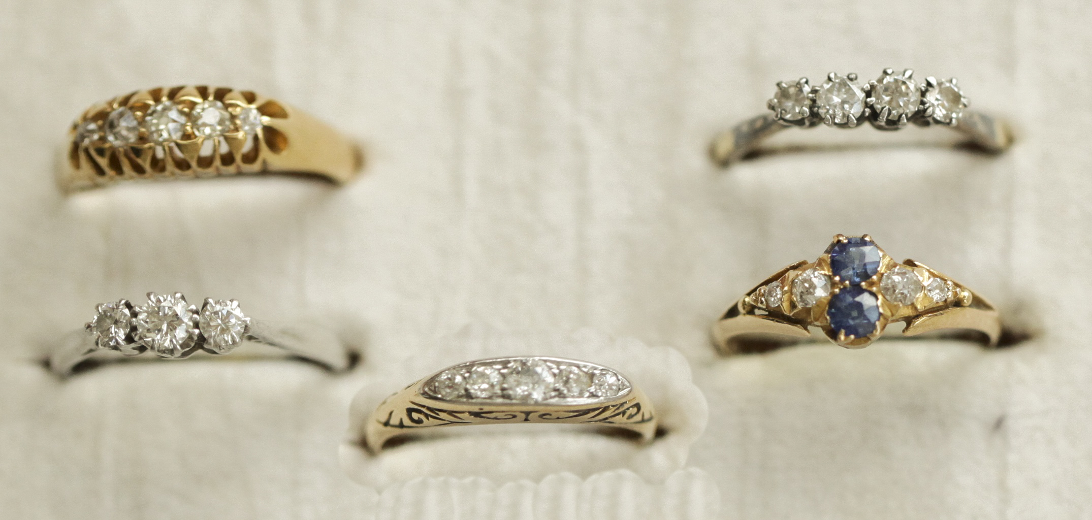 An 18ct gold mounted sapphire and diamond set ring