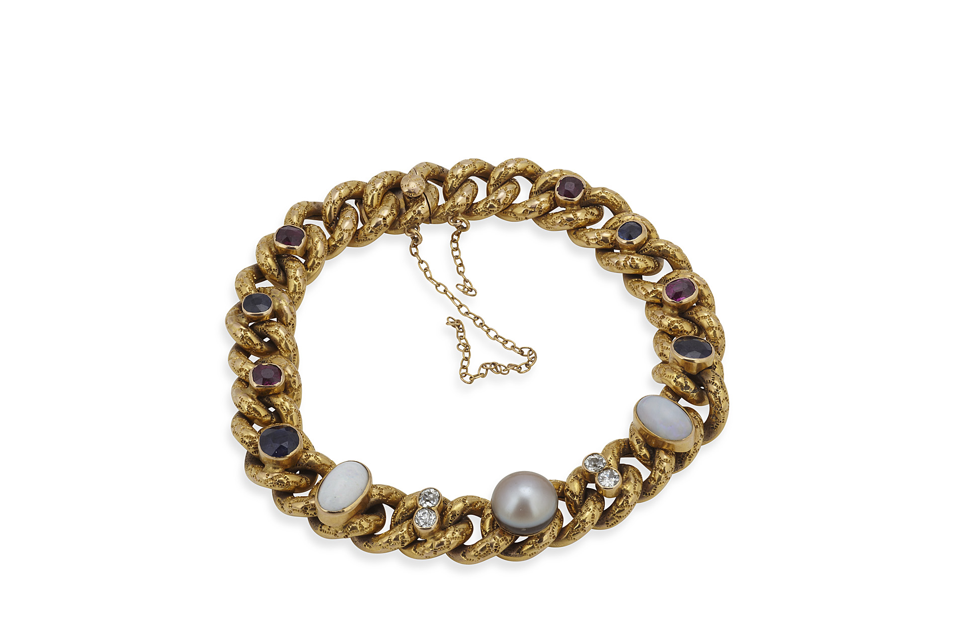 A Edwardian multi-gem set gold bracelet