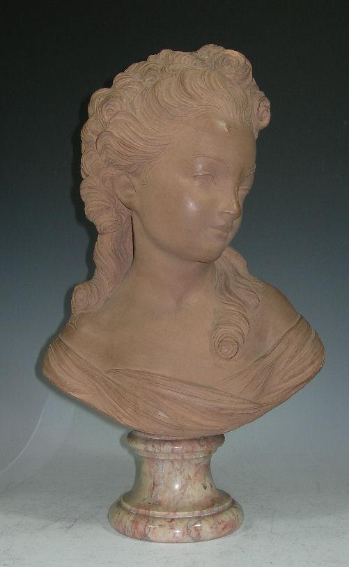 After Jean Antoine Houdon, a terracotta bust of a young girl