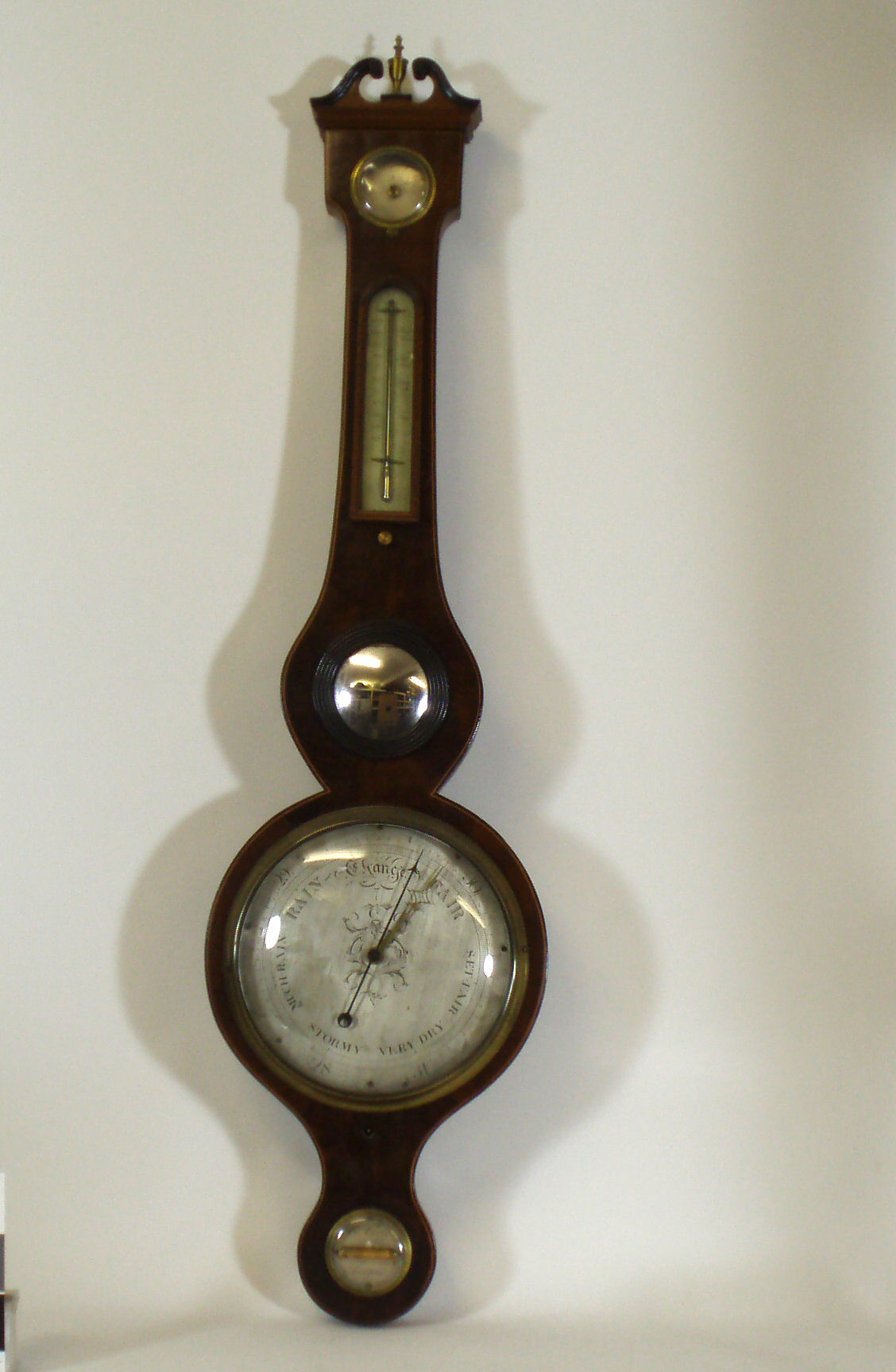 A 19th century mahogany banjo barometer By B. Corti, Glasgow