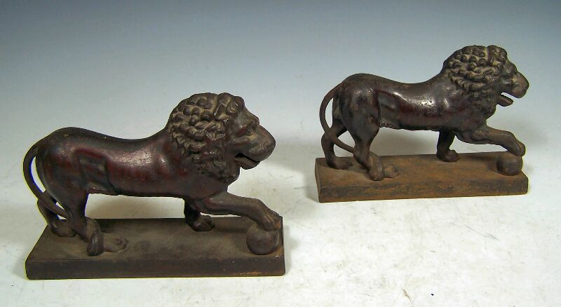 A pair of cast iron Medici lions