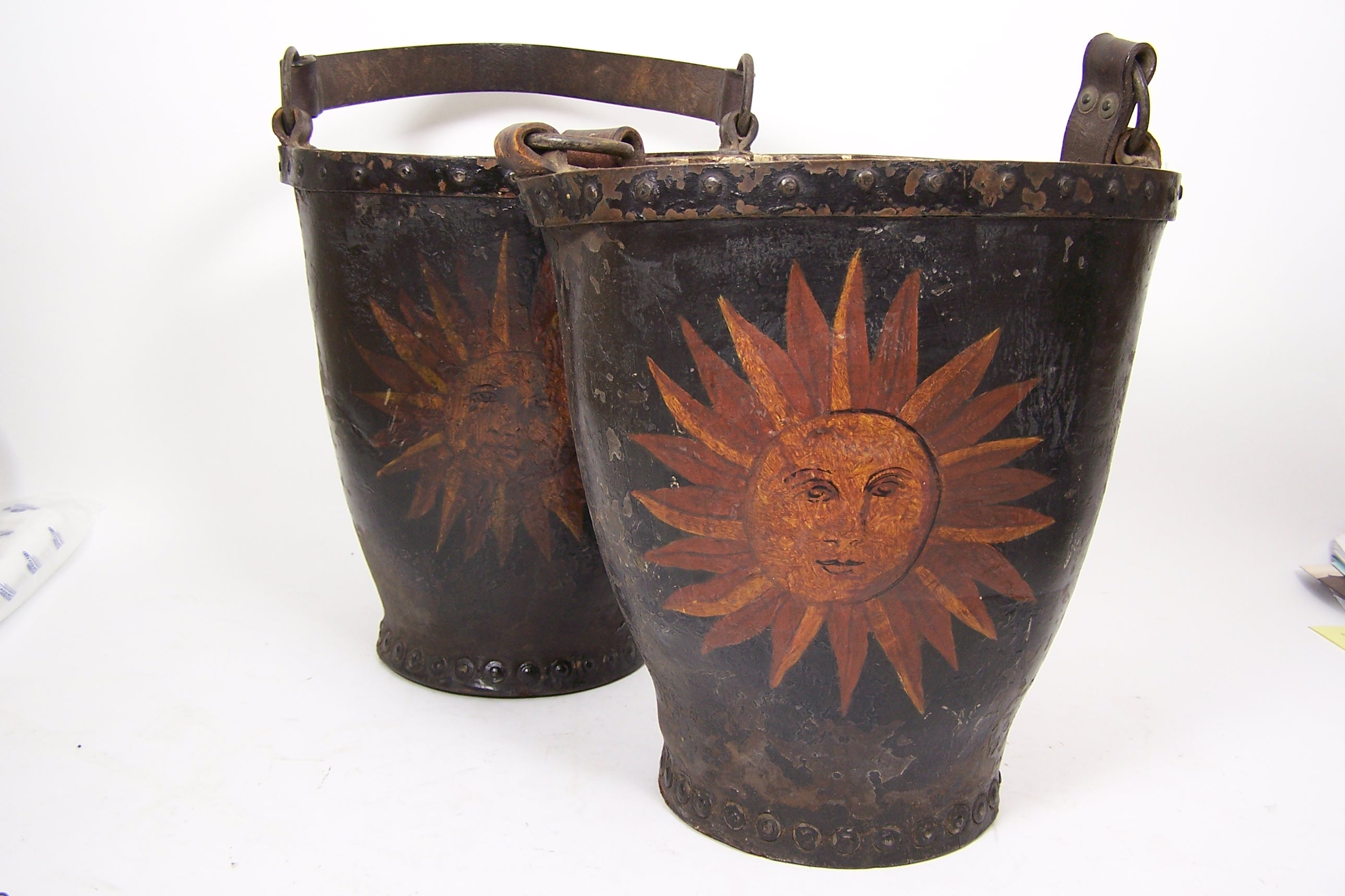 A pair of early 19th century leather fire buckets