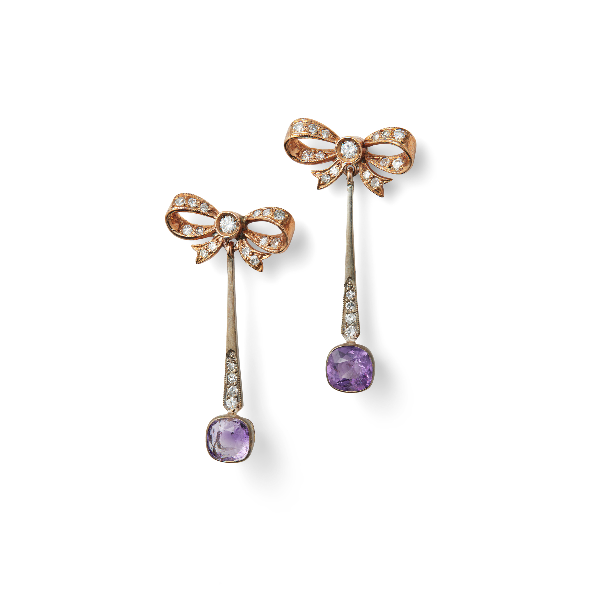 A pair of amethyst and diamond bow pendent earrings