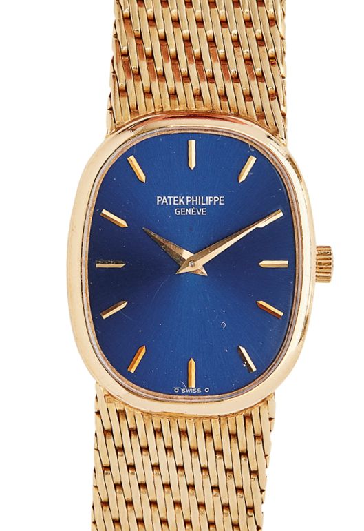 PATEK PHILIPPE - A lady's 18ct gold cased wrist watch