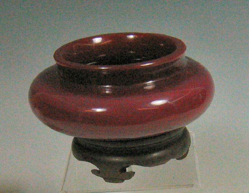 A Chinese Peking glass purple vase