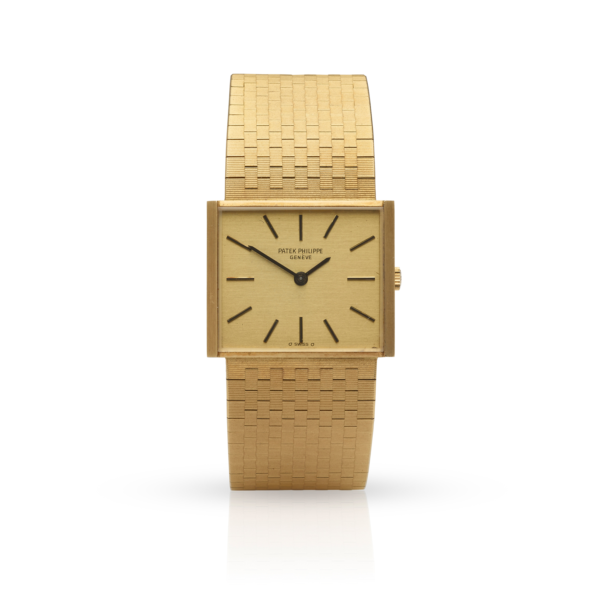 Patek Philippe. A very fine 18k yellow gold rectangular bracelet watch with original box