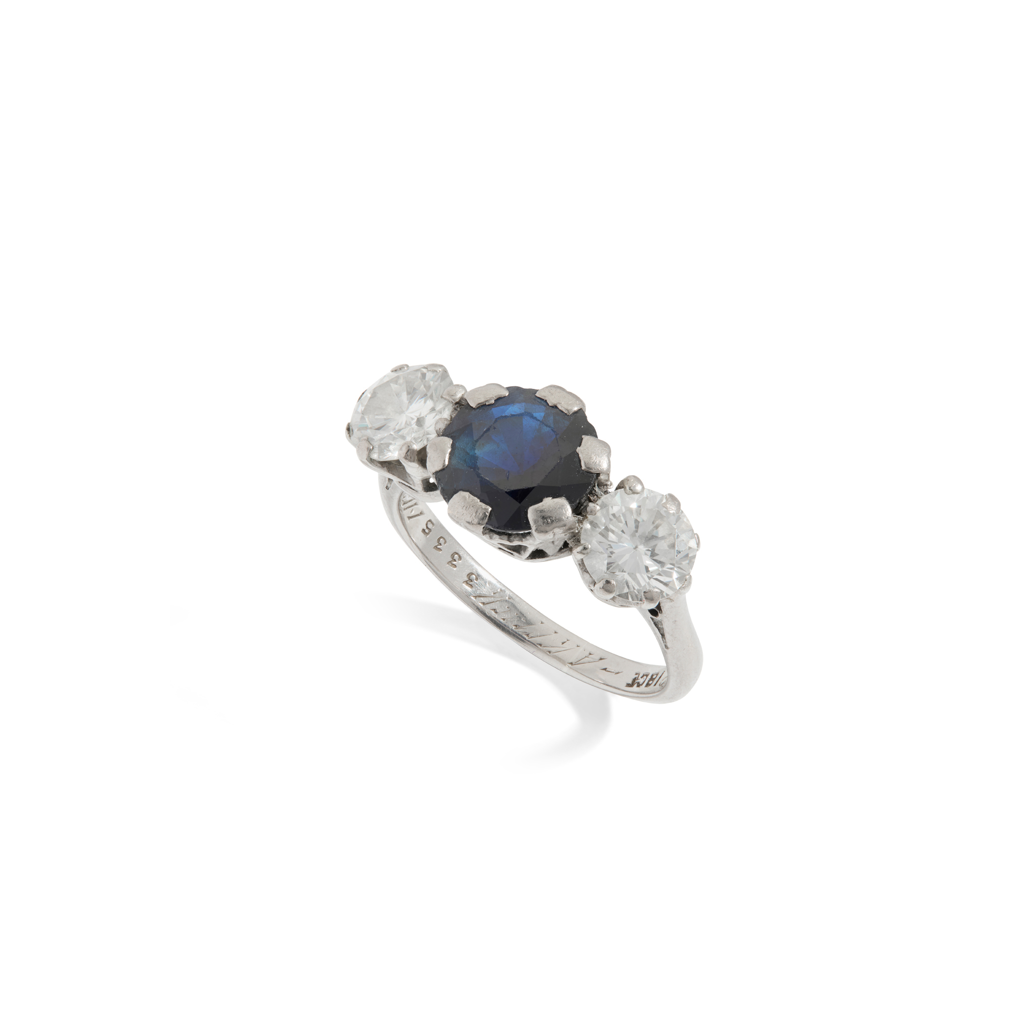 A sapphire and diamond three-stone ring