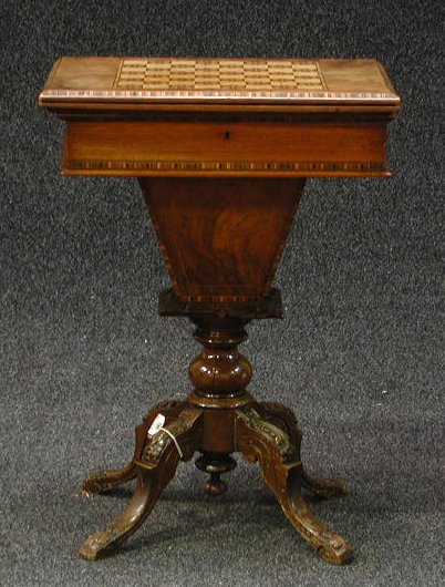 A Victorian walnut games/work table,
