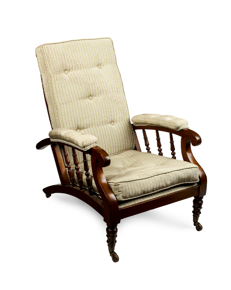WALNUT FRAMED ADJUSTABLE ARMCHAIR IN THE MANNER OF MORRIS & CO.