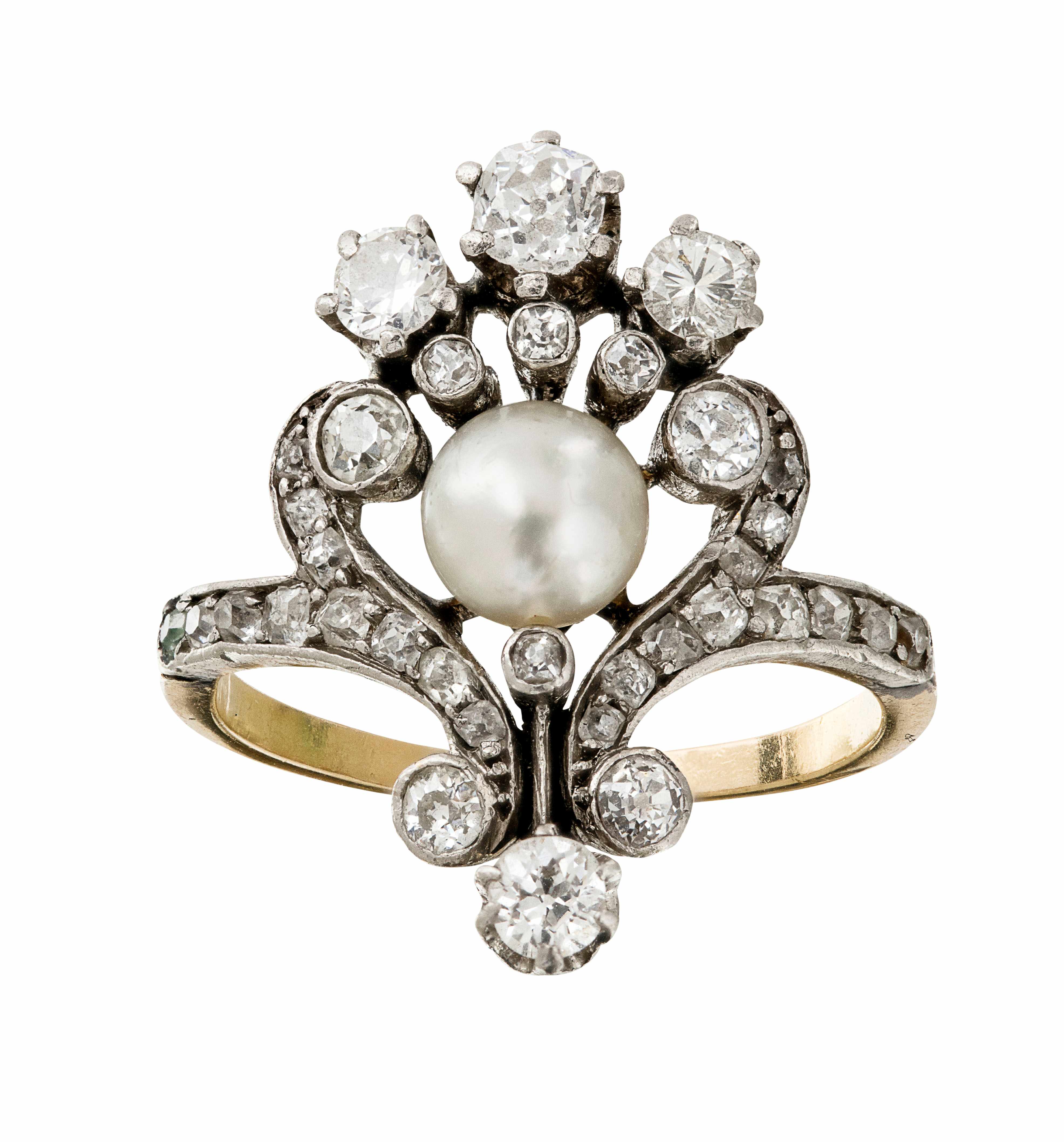 A pearl and diamond set ring