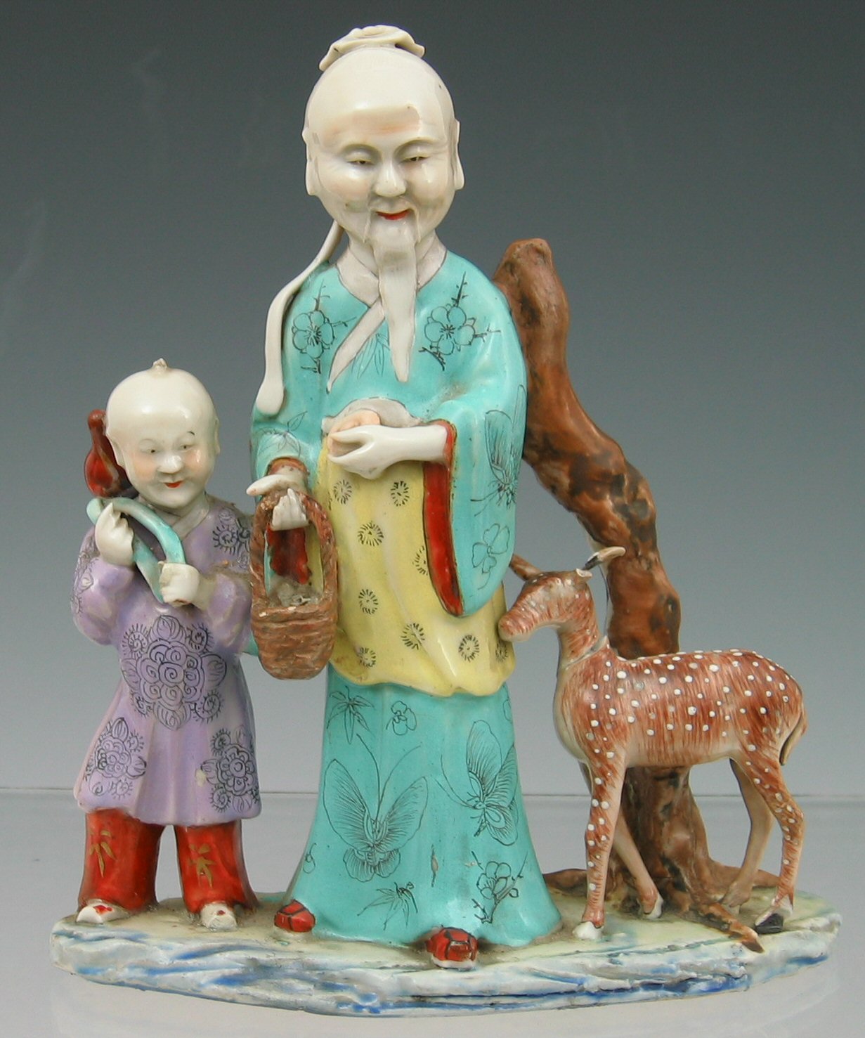 An 18th century famille rose figure group,