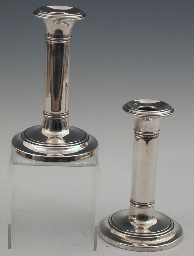 A pair of dwarf table candlesticks