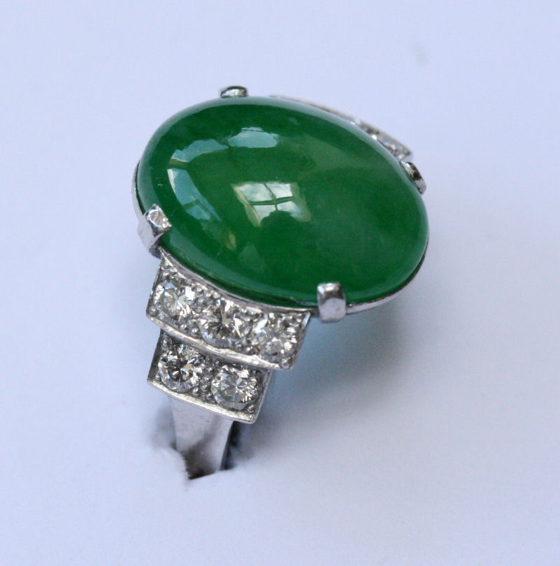 A Art Deco platinum mounted jade and diamond set ring