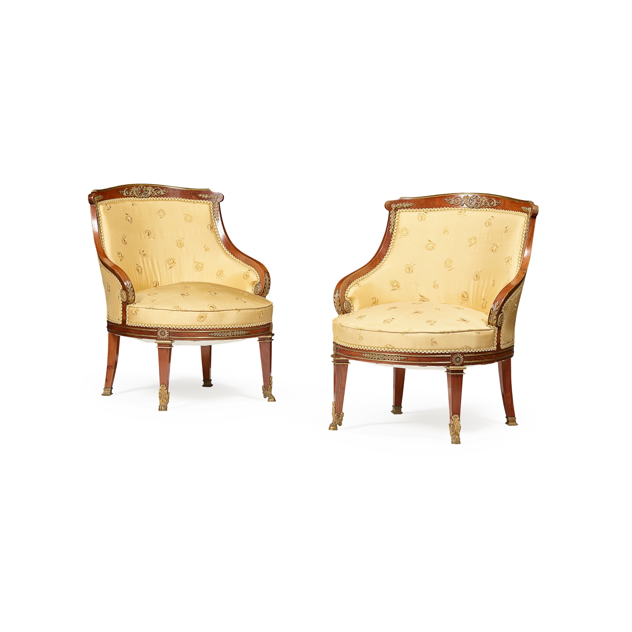 PAIR OF FRENCH SECOND EMPIRE MAHOGANY AND GILT METAL MOUNTED TUB CHAIRS