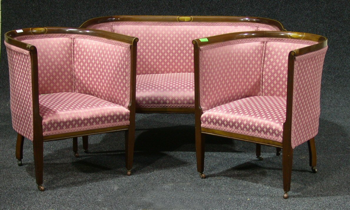 An Edwardian mahogany and boxwood strung three piece parlour suite,