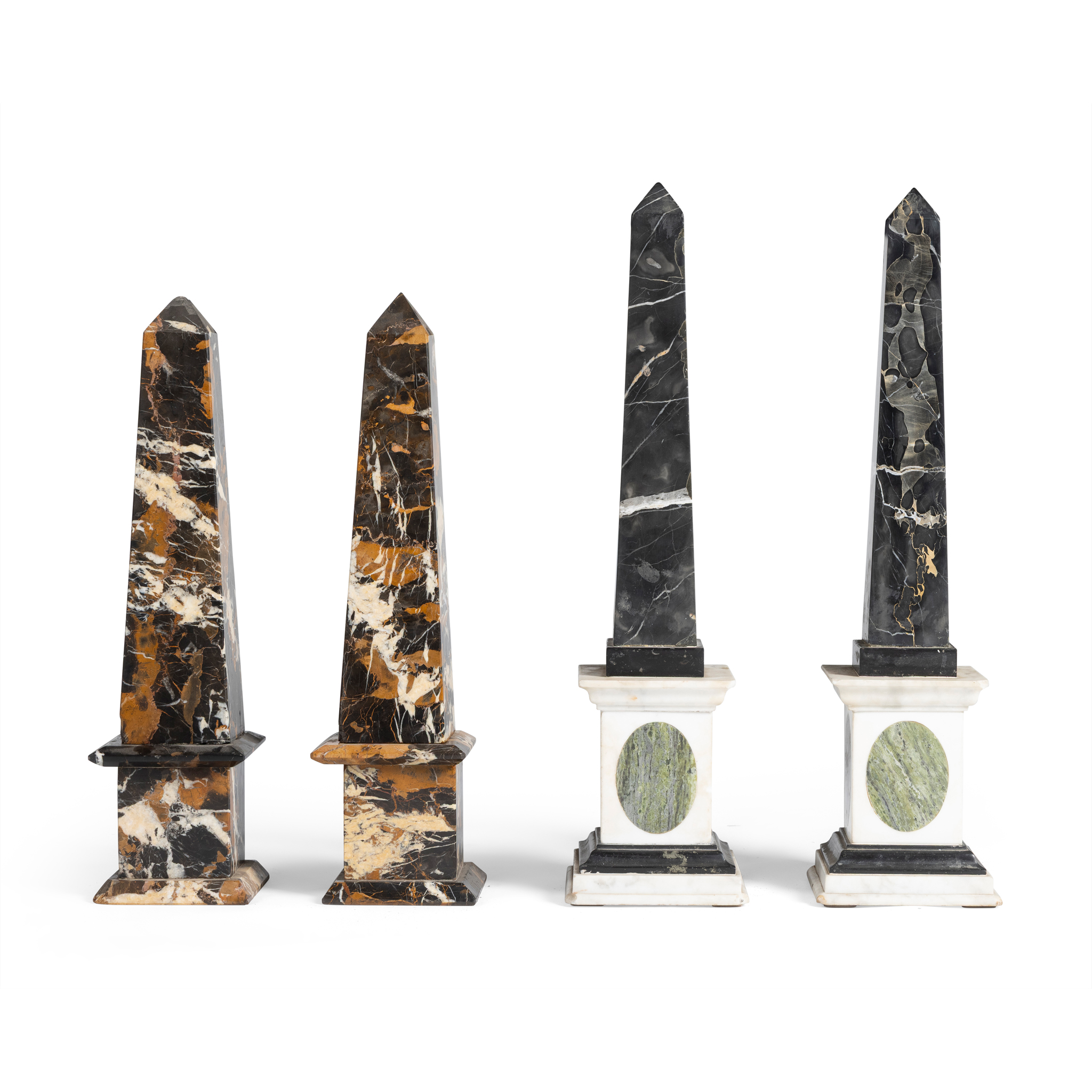TWO PAIRS OF VARIGATED MARBLE OBELISKS