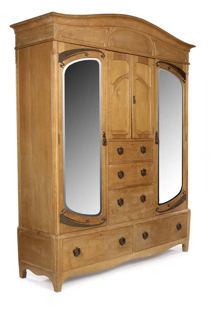 A Continental Art Nouveau walnut bedroom suite