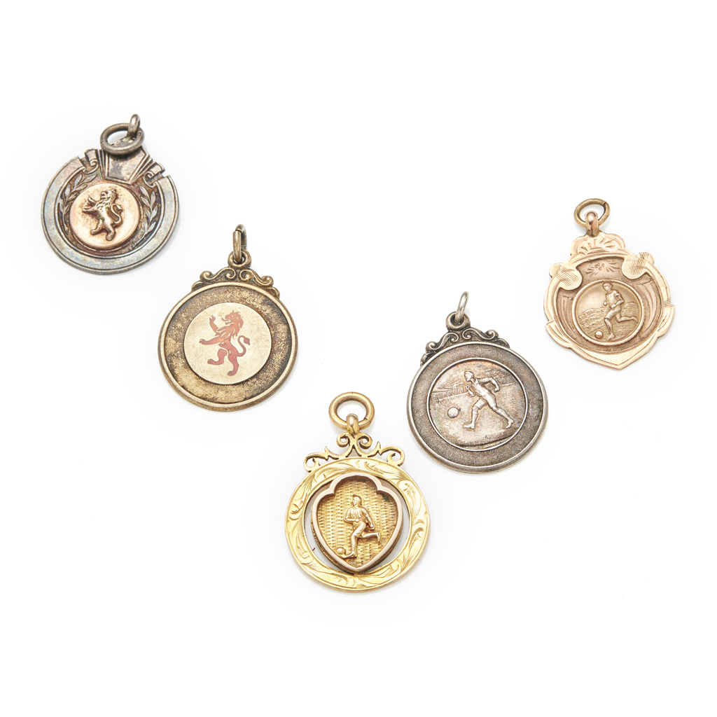 FOOTBALL INTEREST - A group of five football medals