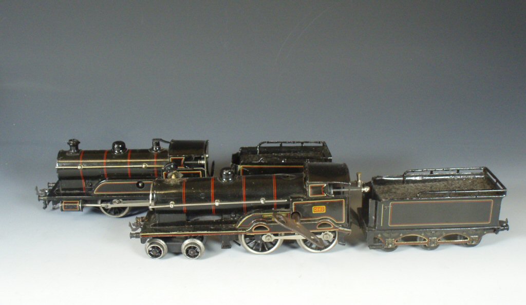 A collection of 'O' Guage clockwork toy trains, circa 1920